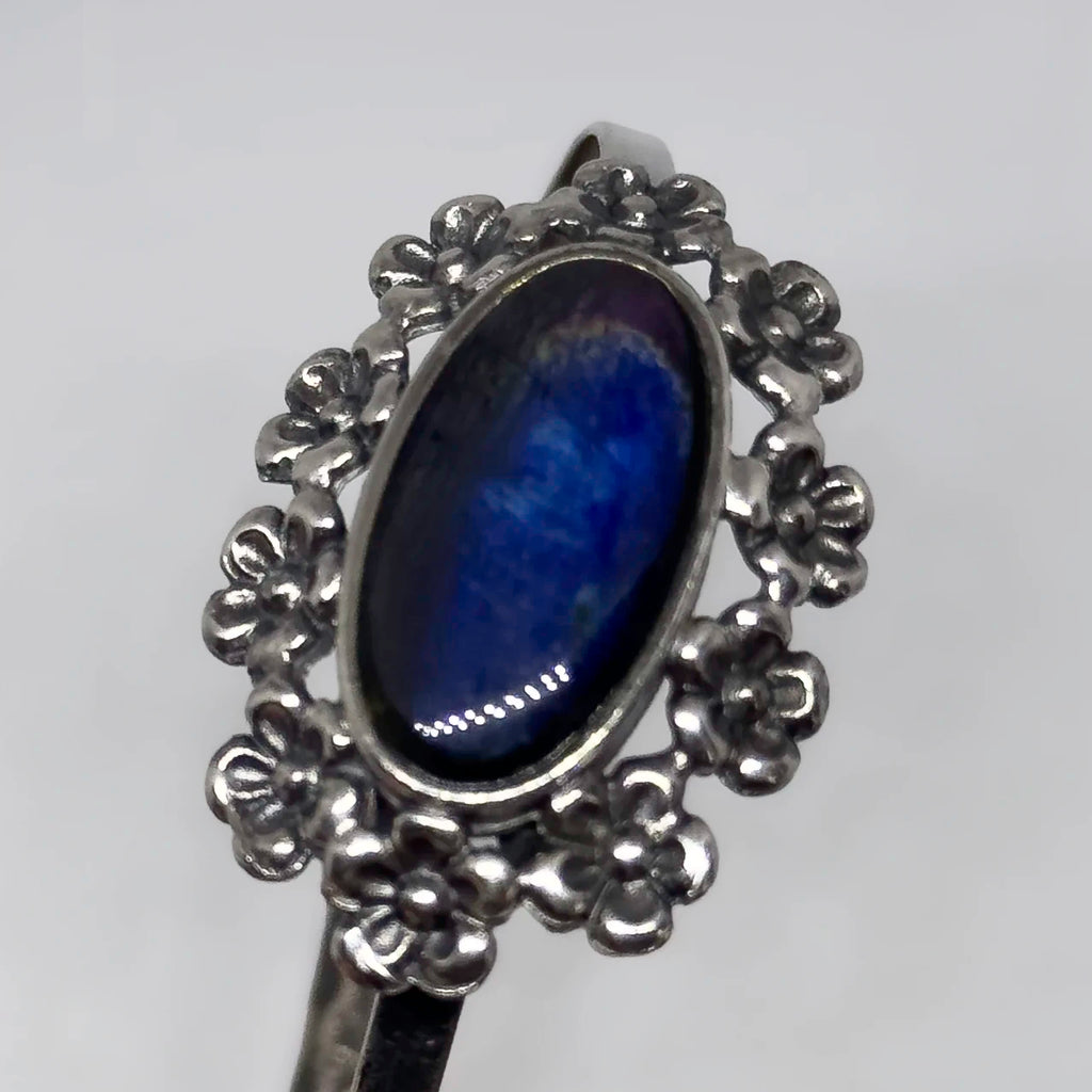 Jorma Laine hopeinen Lemmikki Spektroliitti rannekoru