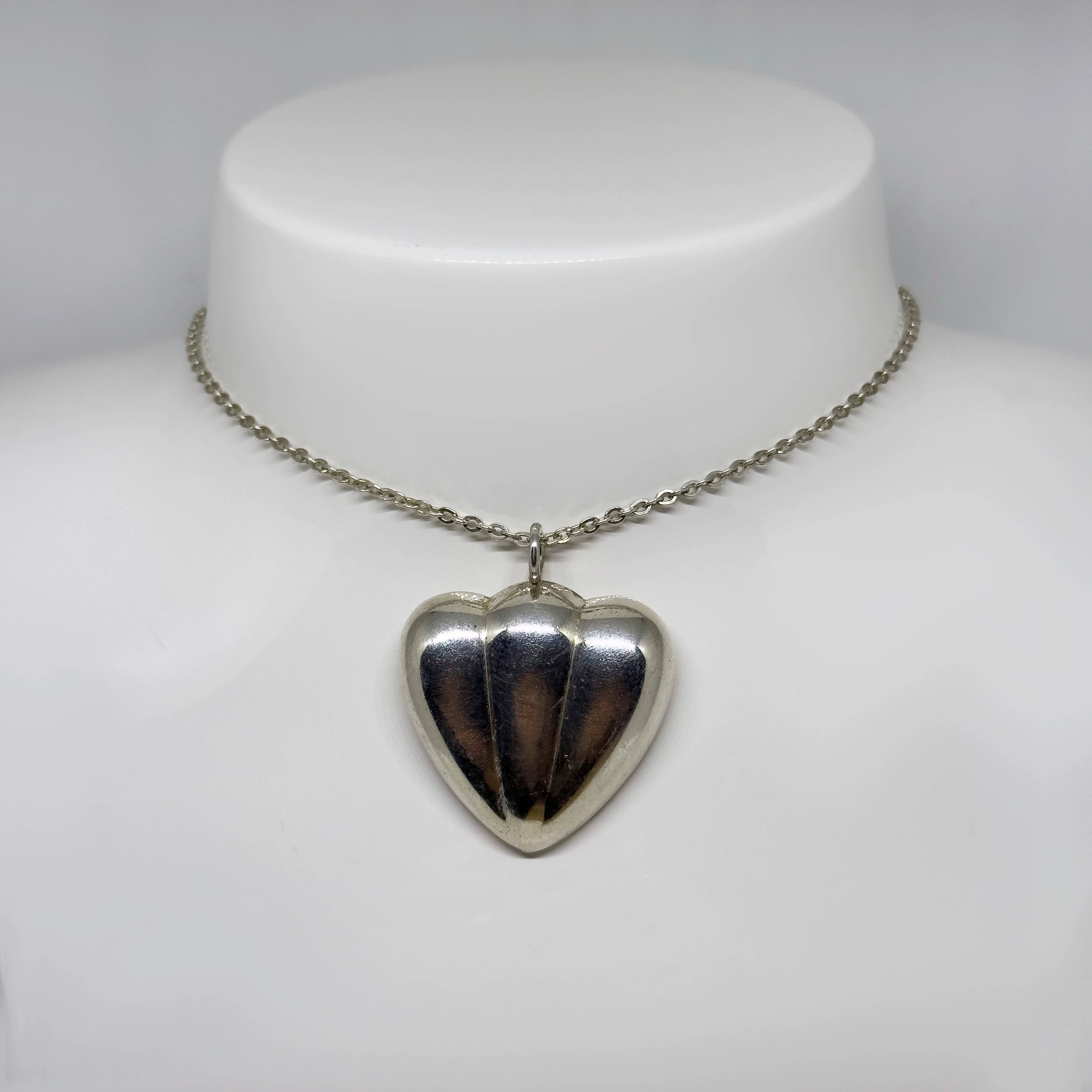 Ristomatti Ratia hopeinen UTR riipus