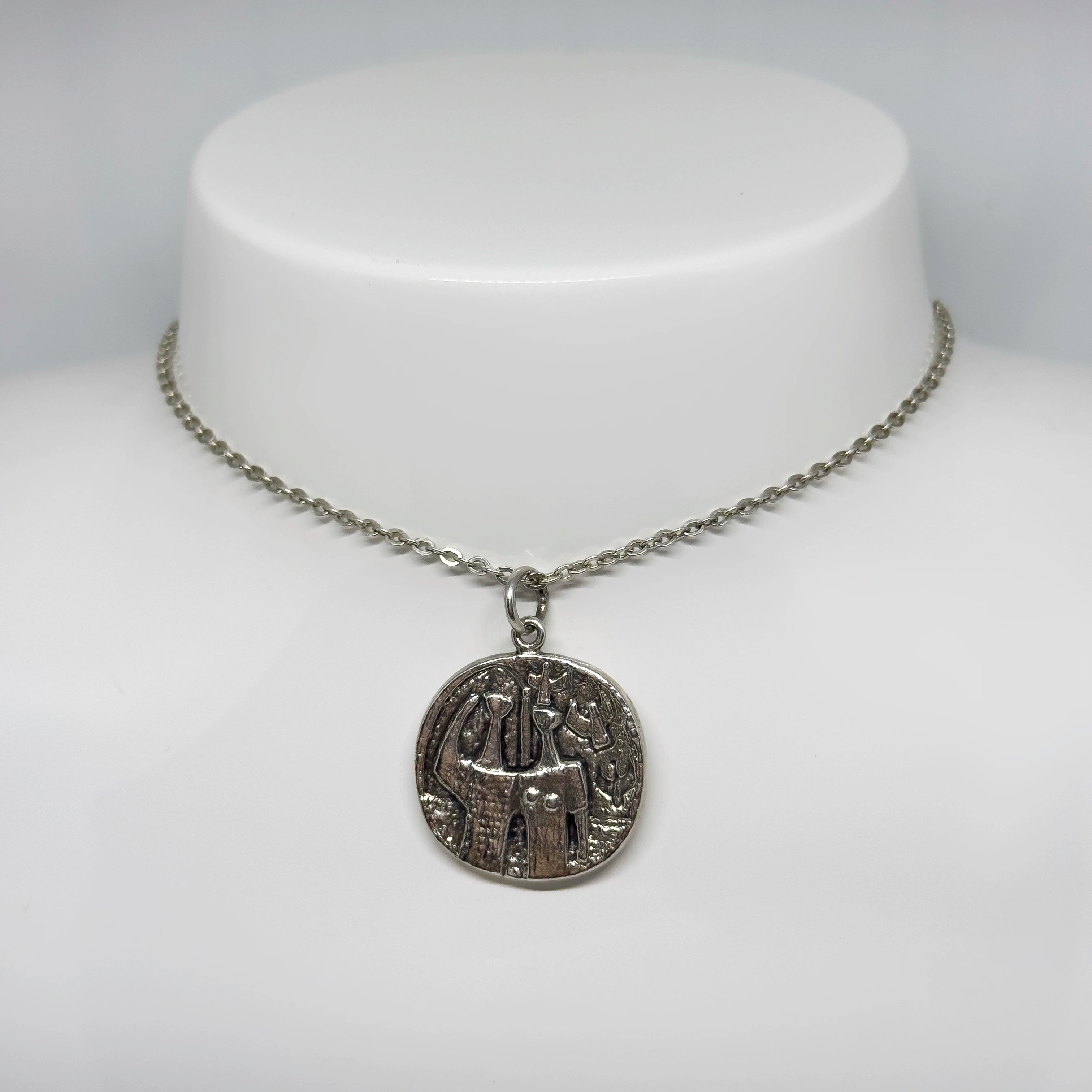 Jorma Laine hopeinen riipus