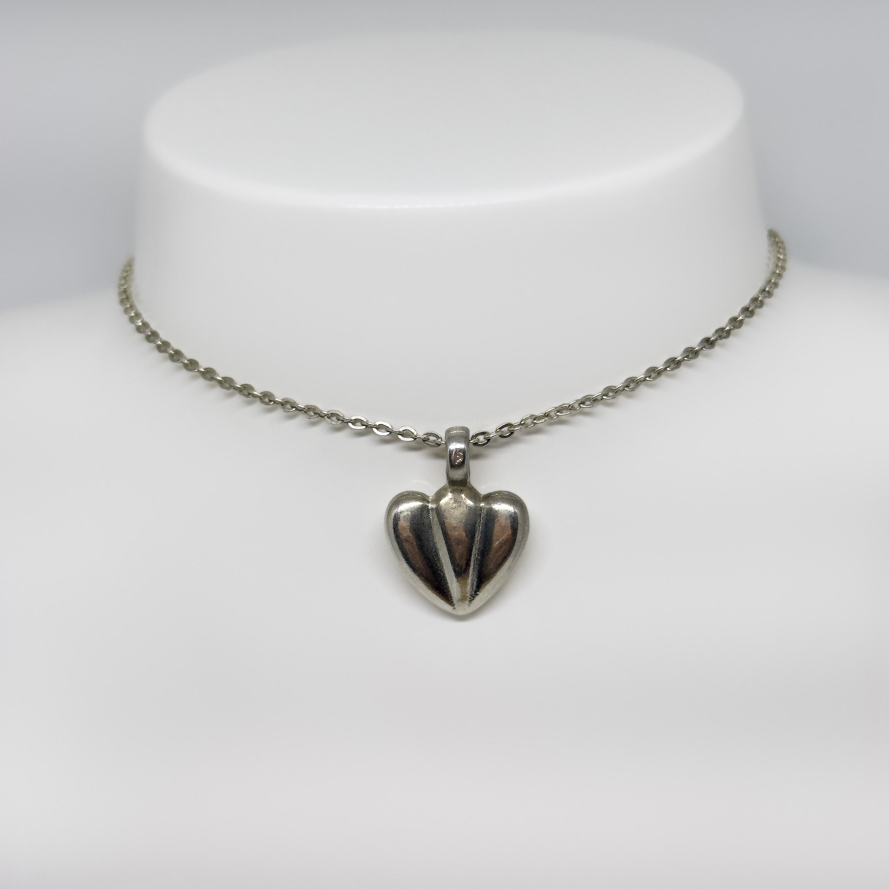 Ristomatti Ratia hopeinen UTR riipus