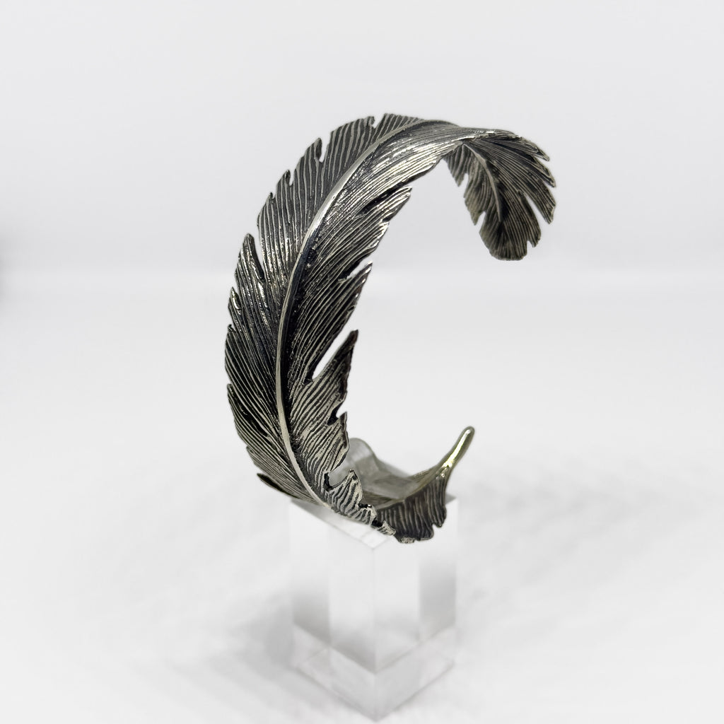 Hopeinen Sulka rannekoru