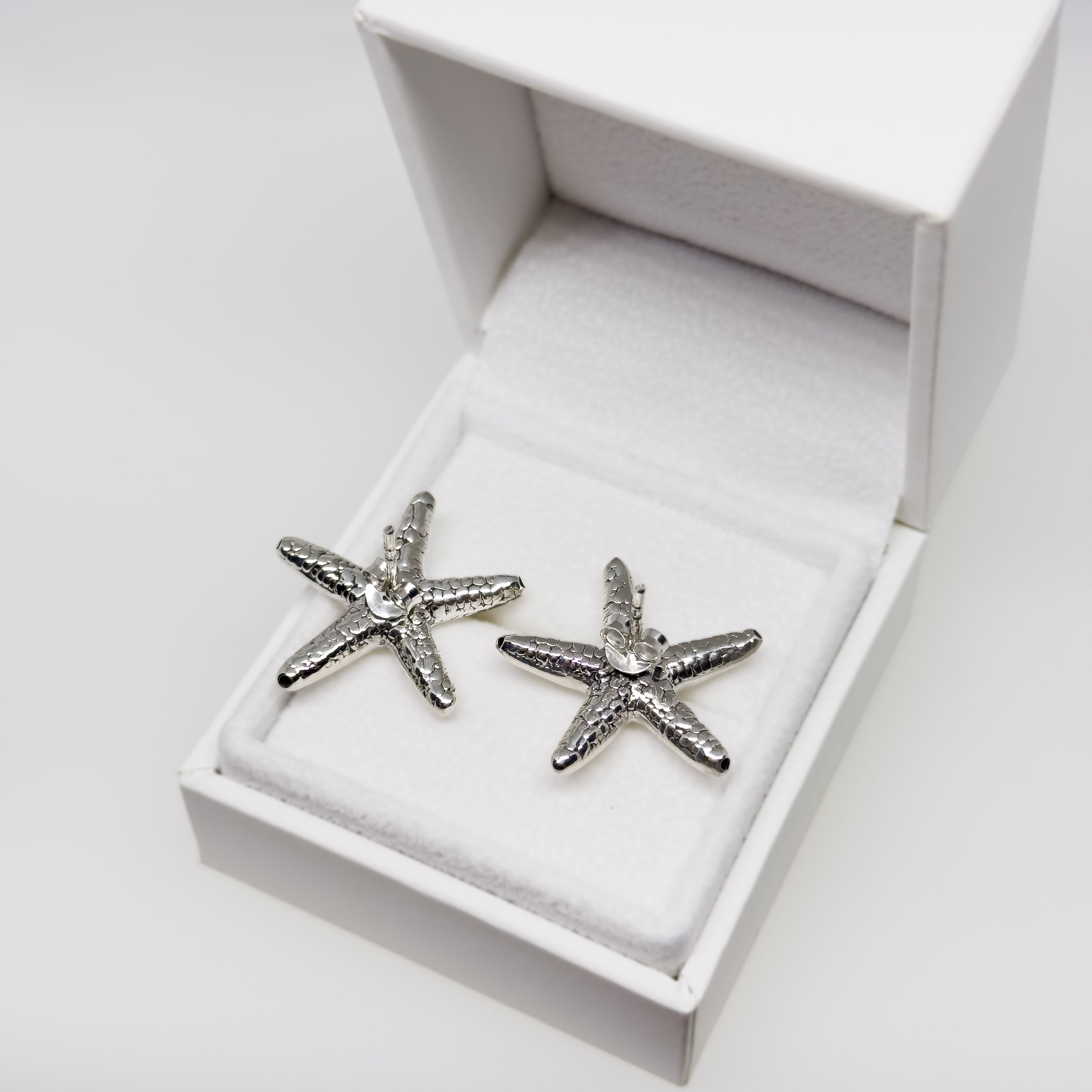 Hopeiset Meritähti korvakorut