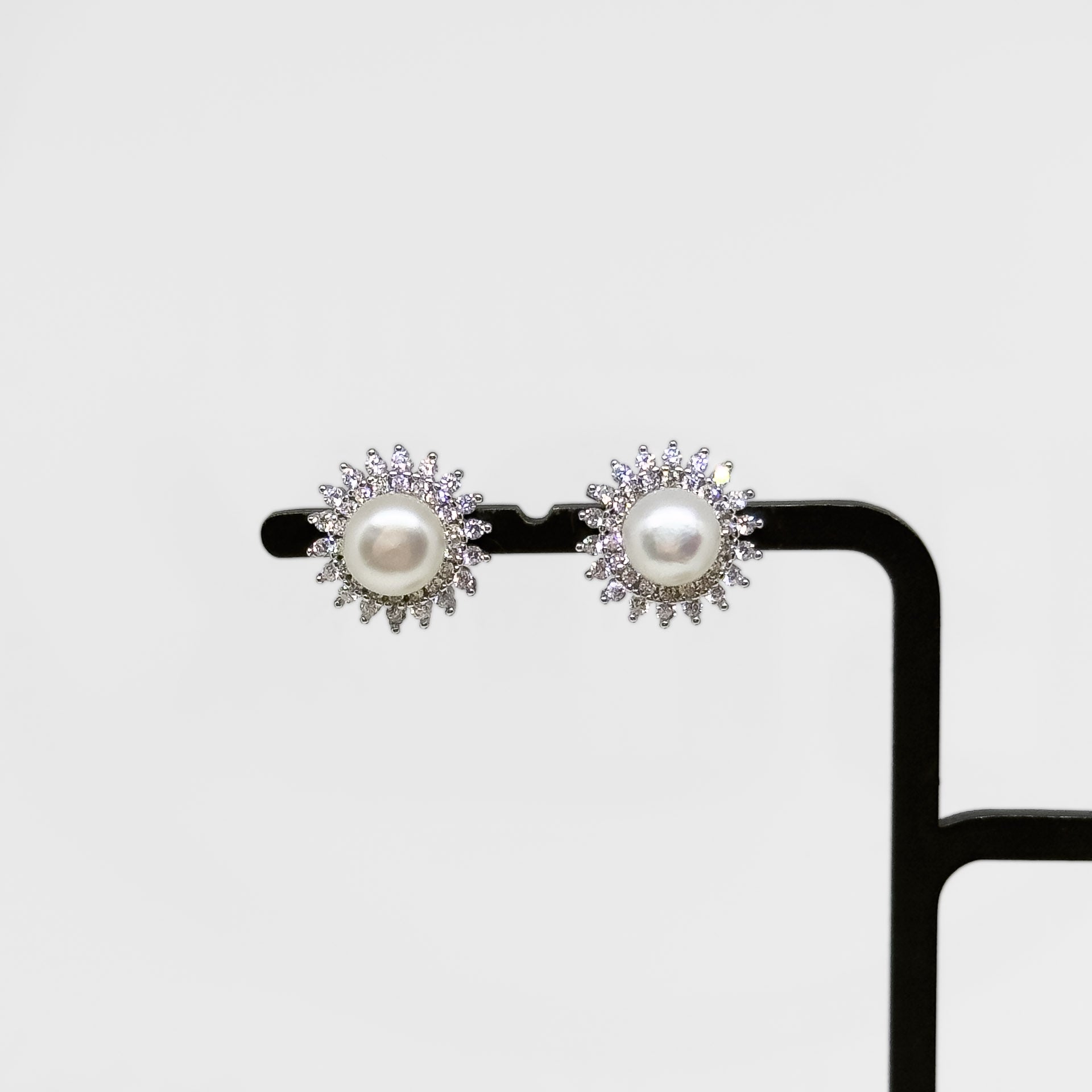 Hopeiset Zirkonia & Makeanvedenhelmi korvakorut