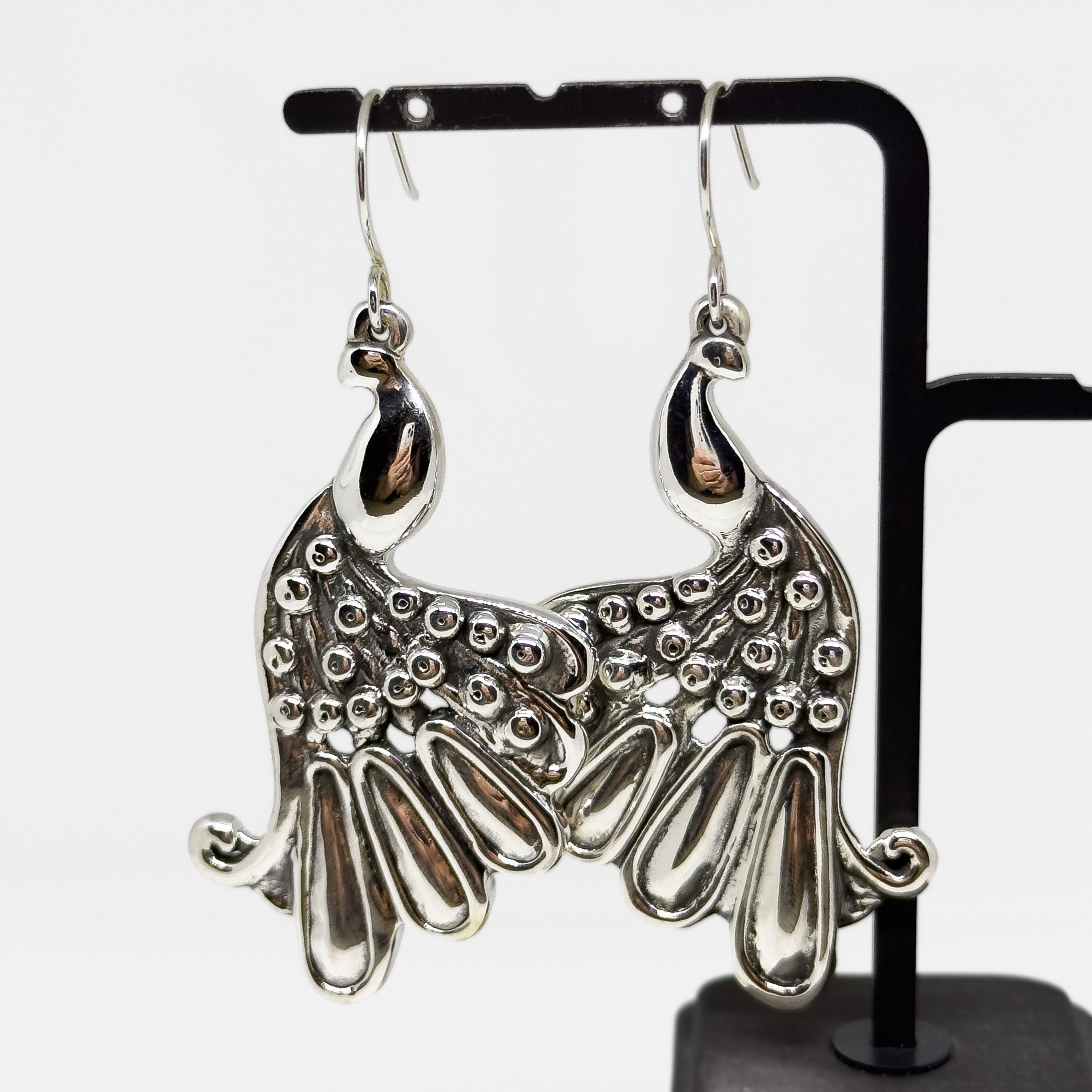 Hopeiset Riikinkukko korvakorut